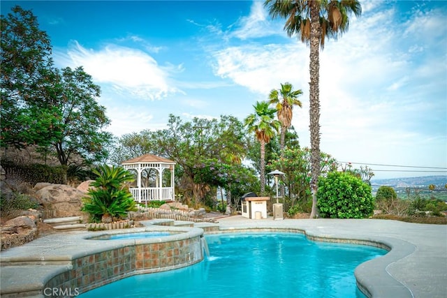 5870 Winncliff Dr, Jurupa Valley, CA 92509 - view of pool featuring a gazebo and a pool with connected hot tub