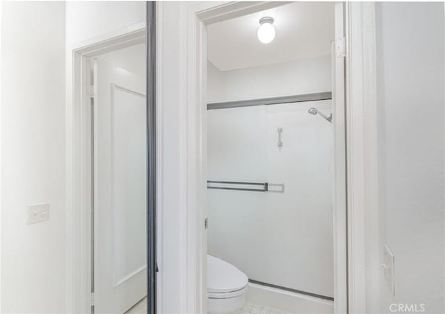 5870 Winncliff Dr, Jurupa Valley, CA 92509 - bathroom featuring a shower stall and tile patterned floors