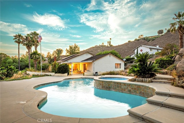 5870 Winncliff Dr, Jurupa Valley, CA 92509 - view of pool featuring a patio and a pool with connected hot tub