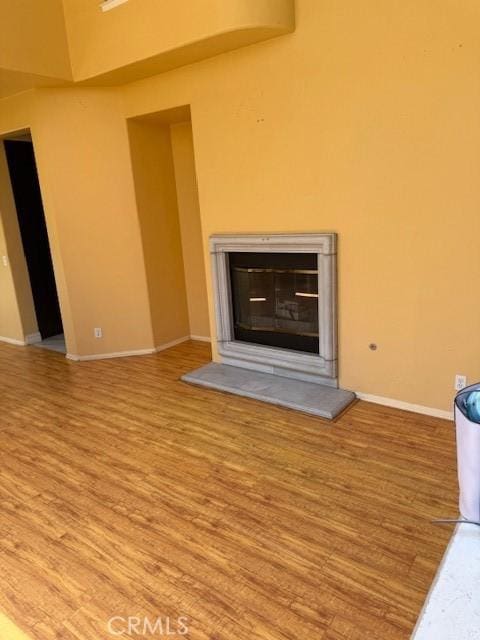 330 E Concord Way, Placentia, CA 92870 - detailed view of a glass covered fireplace and wood finished floors