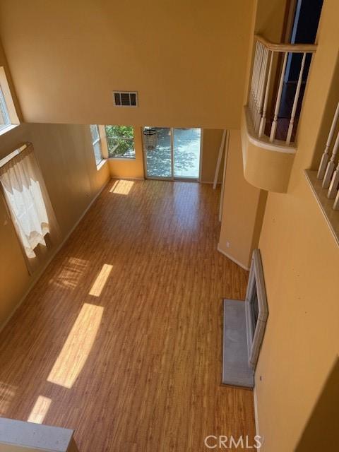 330 E Concord Way, Placentia, CA 92870 - unfurnished living room with wood finished floors and a high ceiling