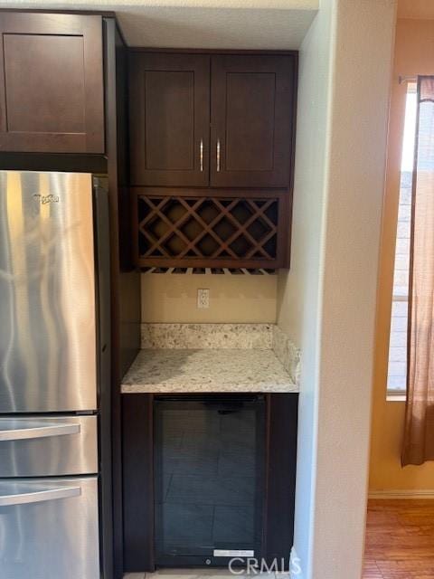 330 E Concord Way, Placentia, CA 92870 - indoor dry bar featuring freestanding refrigerator, wine cooler, and light wood finished floors