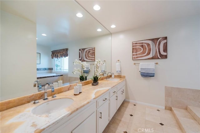 30243 Avenida Selecta, Rancho Palos Verdes, CA 90275 - bathroom with a bathtub, double vanity, recessed lighting, and tile patterned flooring