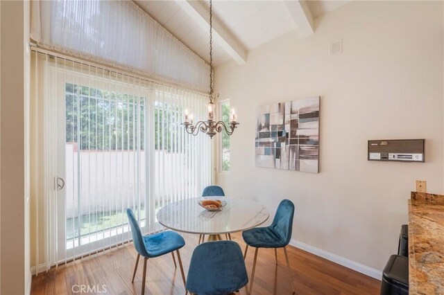 30243 Avenida Selecta, Rancho Palos Verdes, CA 90275 - dining space with a chandelier, beamed ceiling, wood finished floors, plenty of natural light, and high vaulted ceiling