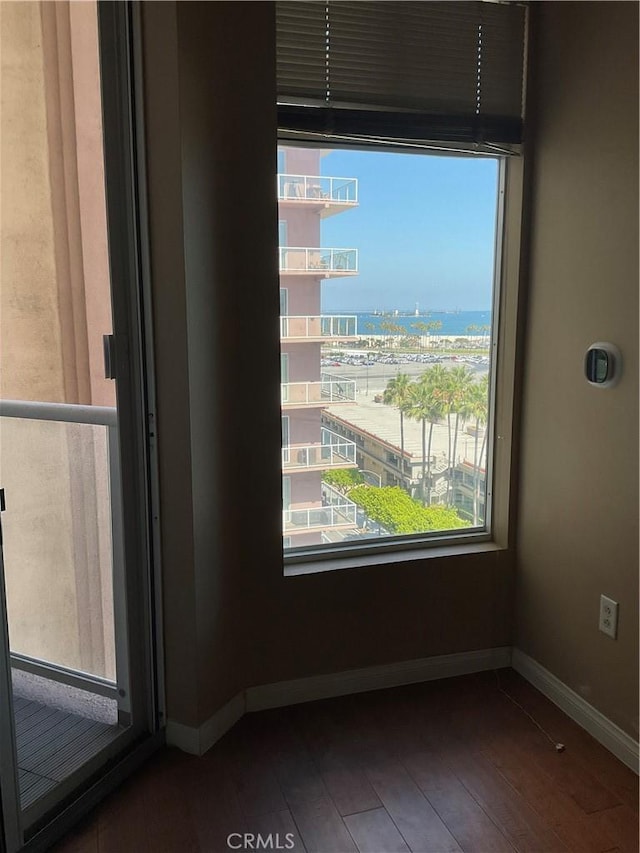 388 E Ocean Blvd Unit 718, Long Beach, CA 90802 - detailed view of wood finished floors and baseboards
