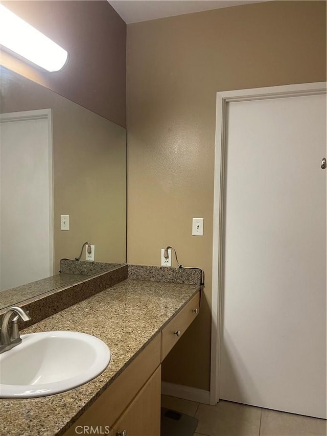 388 E Ocean Blvd Unit 718, Long Beach, CA 90802 - bathroom with tile patterned flooring and vanity