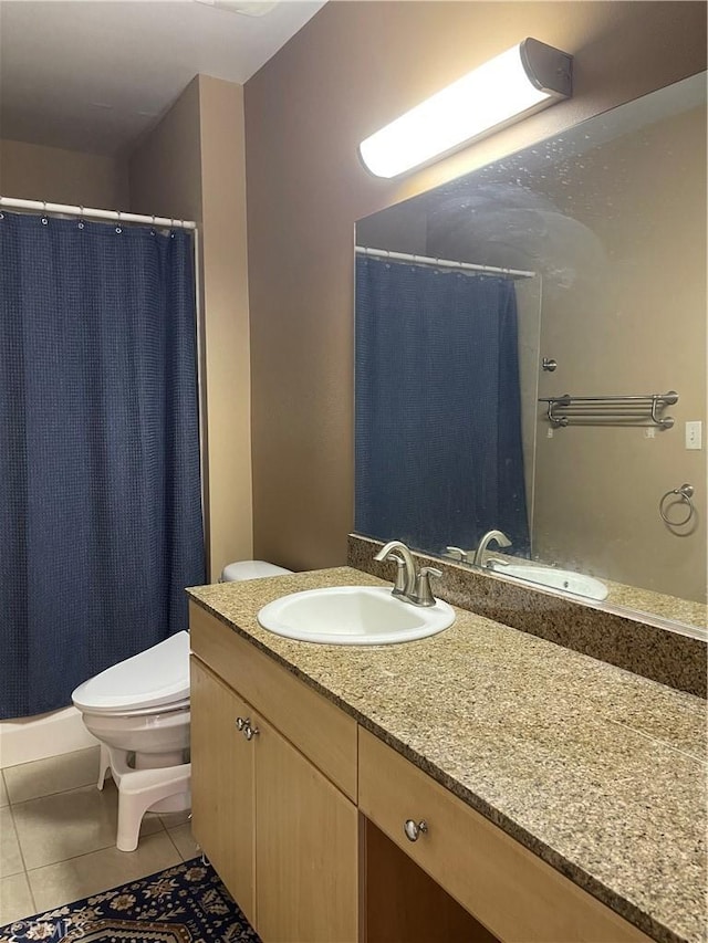 388 E Ocean Blvd Unit 718, Long Beach, CA 90802 - bathroom featuring tile patterned flooring, vanity, and a shower with curtain