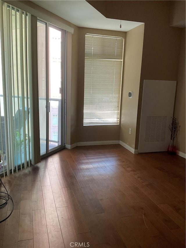 388 E Ocean Blvd Unit 718, Long Beach, CA 90802 - spare room featuring healthy amount of natural light and wood-type flooring