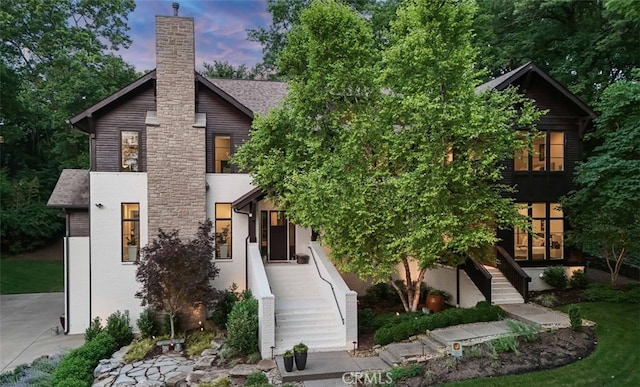 3530 Trimble Ct, Nashville, TN 37215 - view of front of house featuring a chimney, stairs, and a shingled roof
