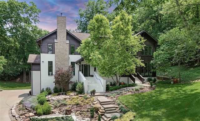 3530 Trimble Ct, Nashville, TN 37215 - view of front of house with stairs, a chimney, and a front yard