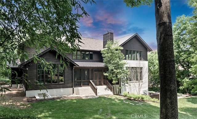 3530 Trimble Ct, Nashville, TN 37215 - rear view of property featuring a sunroom, a lawn, and a chimney