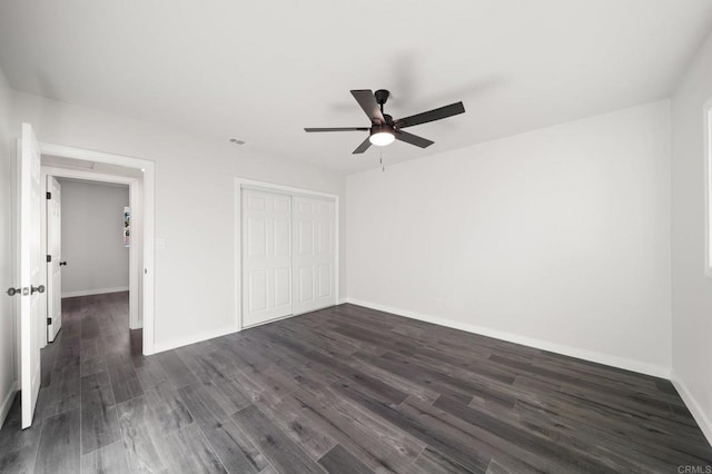 11233 Mountain, Riverside, CA 92505 - unfurnished bedroom featuring dark wood-style floors, a closet, and a ceiling fan