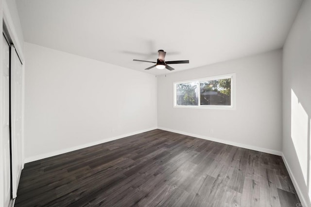 11233 Mountain, Riverside, CA 92505 - unfurnished bedroom with a closet, dark wood-style floors, and a ceiling fan