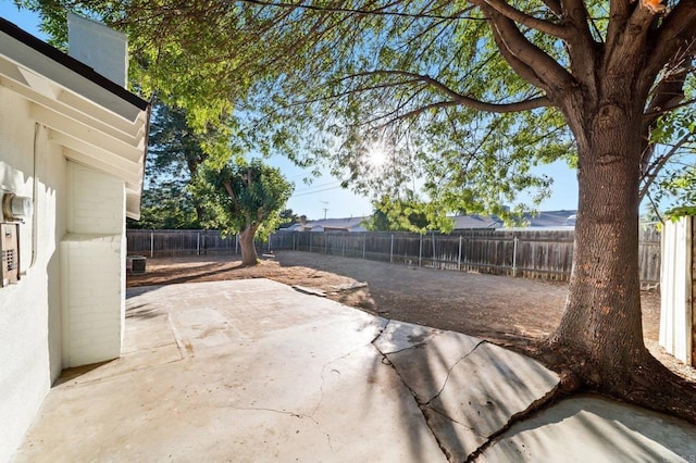 11233 Mountain, Riverside, CA 92505 - fenced backyard with a patio area