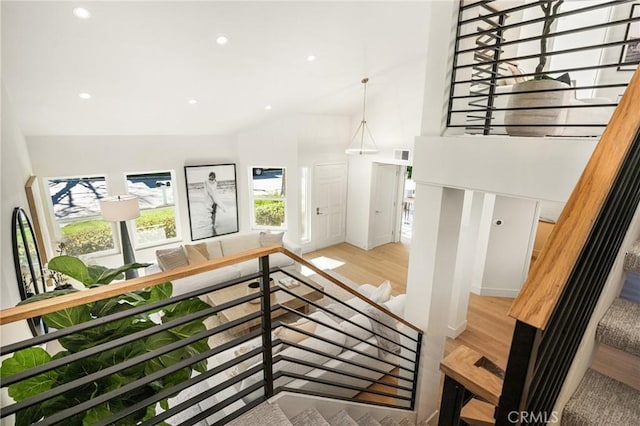 11 Thunder Trl Unit 6, Irvine, CA 92614 - staircase with wood finished floors, recessed lighting, and vaulted ceiling