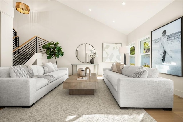 11 Thunder Trl Unit 6, Irvine, CA 92614 - living room with wood finished floors, recessed lighting, stairs, and high vaulted ceiling