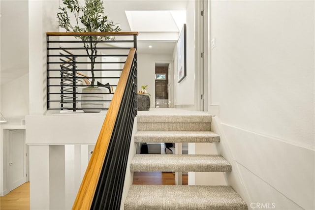11 Thunder Trl Unit 6, Irvine, CA 92614 - staircase featuring wood finished floors