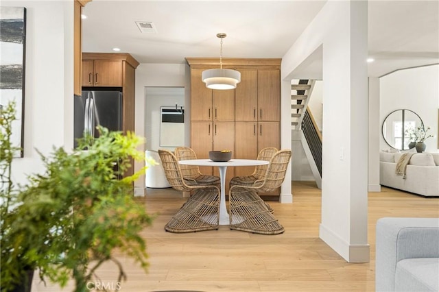 11 Thunder Trl Unit 6, Irvine, CA 92614 - dining area with stairs, light wood-style floors, and recessed lighting