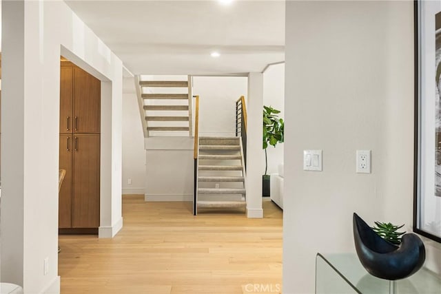 11 Thunder Trl Unit 6, Irvine, CA 92614 - hallway featuring light wood finished floors, stairway, and recessed lighting