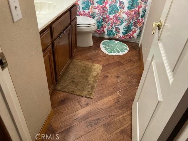 20823 Plum Cyn, Saugus, CA 91350 - bathroom featuring hardwood / wood-style flooring, vanity, and a shower with curtain