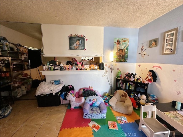 3747 Mintern St, Jurupa Valley, CA 92509 - recreation room featuring a textured ceiling and tile patterned floors