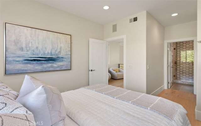 7 Suprema Dr, Newport Coast, CA 92657 - bedroom featuring wood finished floors, recessed lighting, and connected bathroom