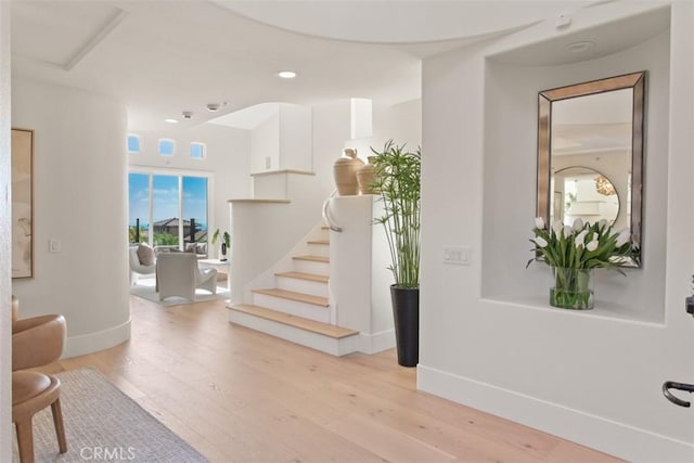 7 Suprema Dr, Newport Coast, CA 92657 - foyer entrance with wood finished floors, stairs, and recessed lighting