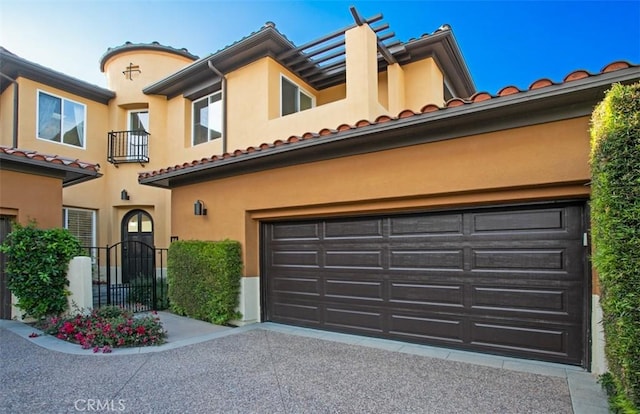 7 Suprema Dr, Newport Coast, CA 92657 - mediterranean / spanish house with stucco siding, a tiled roof, a garage, and driveway