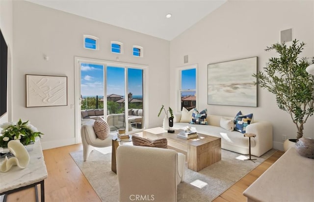 7 Suprema Dr, Newport Coast, CA 92657 - living room featuring high vaulted ceiling and light wood finished floors