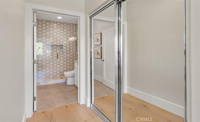 7 Suprema Dr, Newport Coast, CA 92657 - full bathroom featuring a shower stall and wood finished floors
