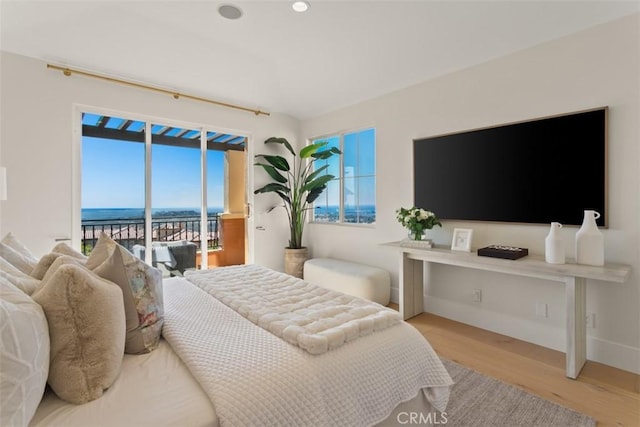 7 Suprema Dr, Newport Coast, CA 92657 - bedroom featuring access to exterior and wood finished floors