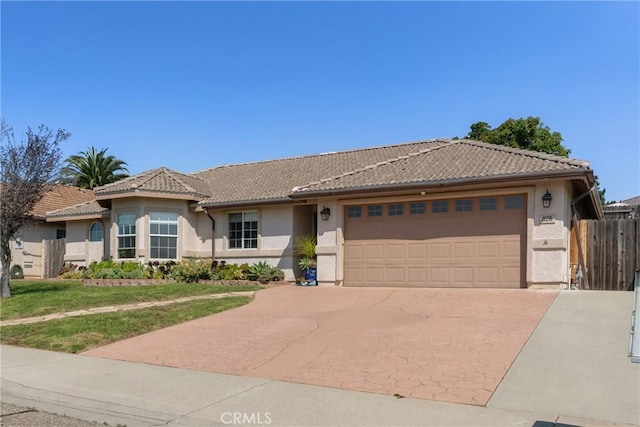 825 Rosana Pl, Nipomo, CA 93444 - ranch-style house with stucco siding, concrete driveway, an attached garage, and a tiled roof