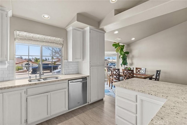 825 Rosana Pl, Nipomo, CA 93444 - kitchen featuring stainless steel dishwasher, tasteful backsplash, light wood finished floors, plenty of natural light, and recessed lighting