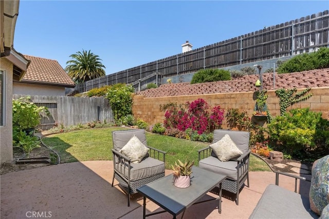 825 Rosana Pl, Nipomo, CA 93444 - fenced backyard featuring a patio and outdoor lounge area
