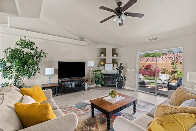 825 Rosana Pl, Nipomo, CA 93444 - living room with ceiling fan, lofted ceiling, and a glass covered fireplace