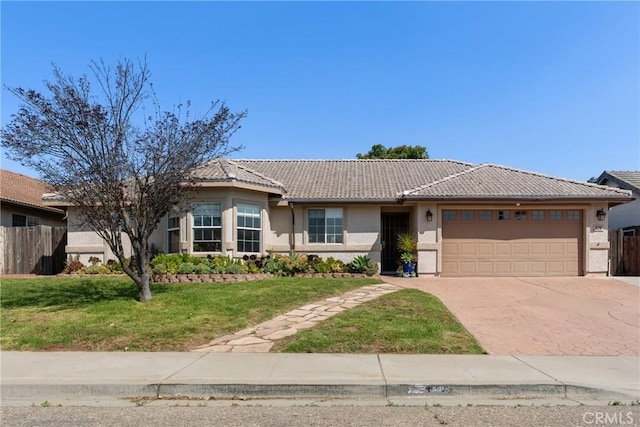 825 Rosana Pl, Nipomo, CA 93444 - ranch-style home with an attached garage, a tile roof, stucco siding, and concrete driveway