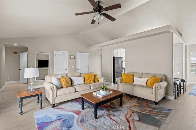 825 Rosana Pl, Nipomo, CA 93444 - living room with arched walkways, light wood-type flooring, a ceiling fan, and lofted ceiling