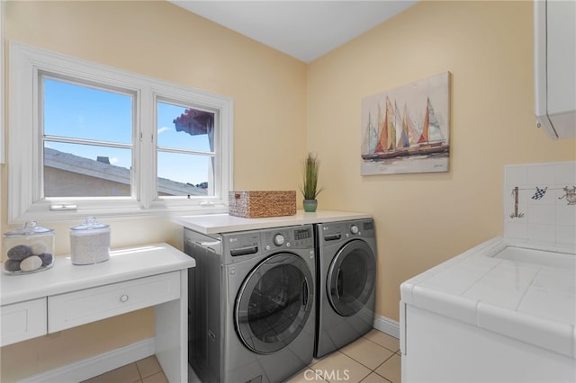 1337 8th St, Manhattan Beach, CA 90266 - washroom with washing machine and dryer and light tile patterned flooring
