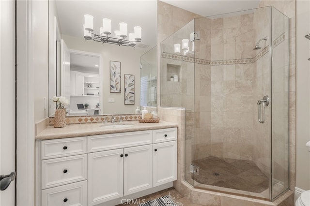 1337 8th St, Manhattan Beach, CA 90266 - bathroom featuring a shower stall, vanity, and backsplash