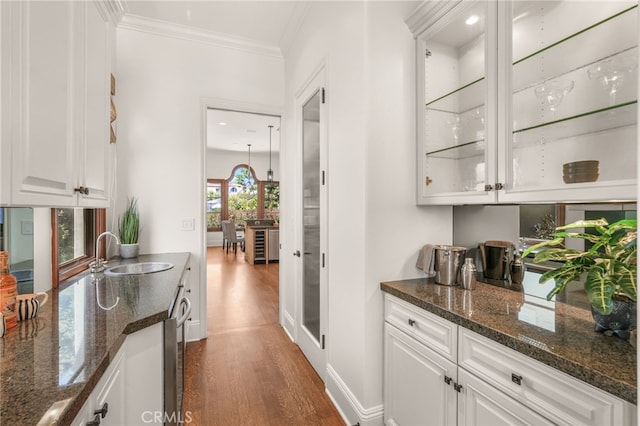 1337 8th St, Manhattan Beach, CA 90266 - bar area featuring dark wood-type flooring, ornamental molding, and recessed lighting