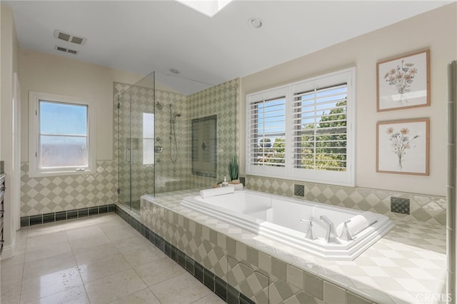 1337 8th St, Manhattan Beach, CA 90266 - full bath with tile patterned floors, a garden tub, plenty of natural light, and a stall shower