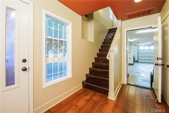 1002 Leighton Ave, Los Angeles, CA 90037 - doorway with stairway and wood finished floors