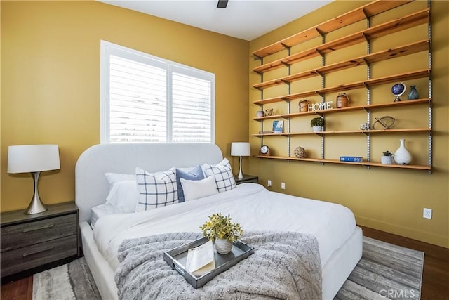 1002 Leighton Ave, Los Angeles, CA 90037 - bedroom featuring wood finished floors and baseboards