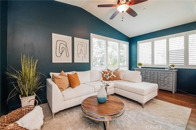 1002 Leighton Ave, Los Angeles, CA 90037 - living area featuring lofted ceiling, wood finished floors, and ceiling fan