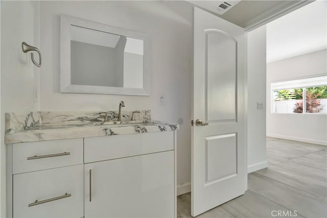 6943 Goodland Ave, North Hollywood, CA 91605 - bathroom with vanity and baseboards