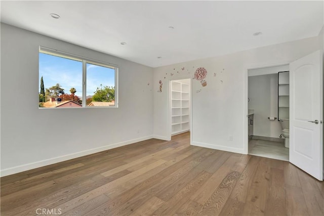 6943 Goodland Ave, North Hollywood, CA 91605 - unfurnished room featuring wood finished floors and baseboards