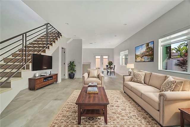 6943 Goodland Ave, North Hollywood, CA 91605 - living room featuring stairway and concrete flooring