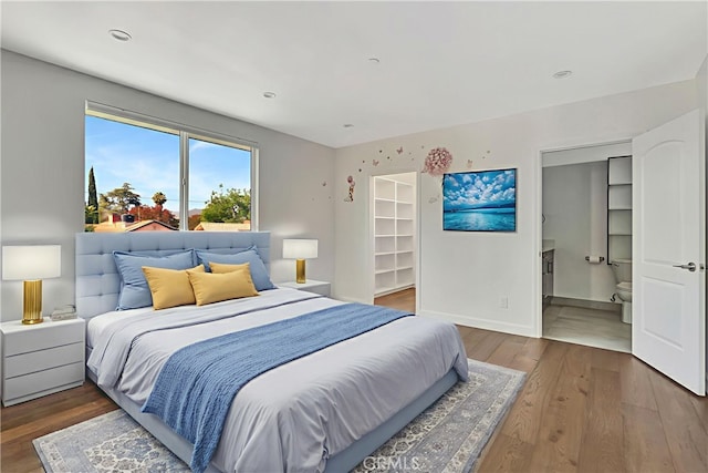 6943 Goodland Ave, North Hollywood, CA 91605 - bedroom featuring wood finished floors and ensuite bath