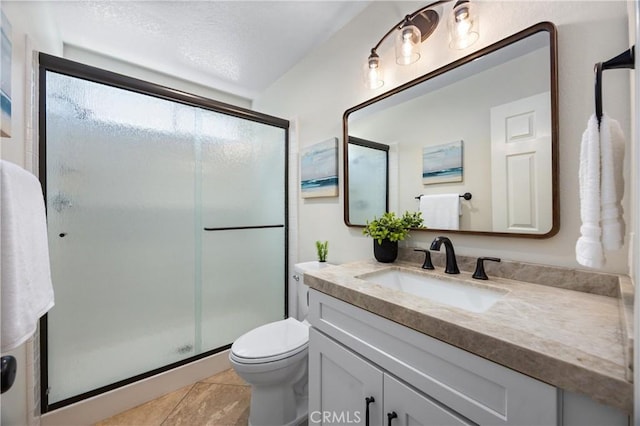 18 Via Tigra, Rancho Santa Margarita, CA 92688 - bathroom with vanity, a shower stall, and tile patterned floors