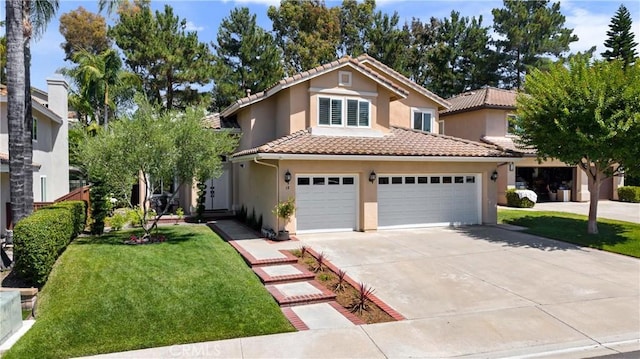 18 Via Tigra, Rancho Santa Margarita, CA 92688 - view of front of property featuring stucco siding, a tile roof, driveway, a front yard, and a garage